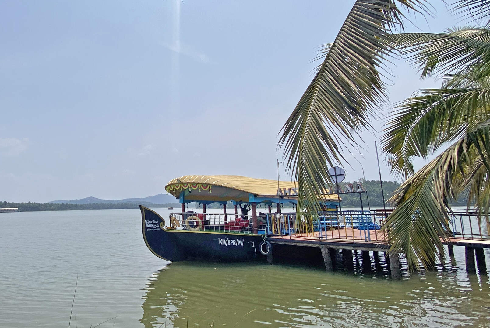Side view of traditional Kerala boat at Akalappuzha backwaters