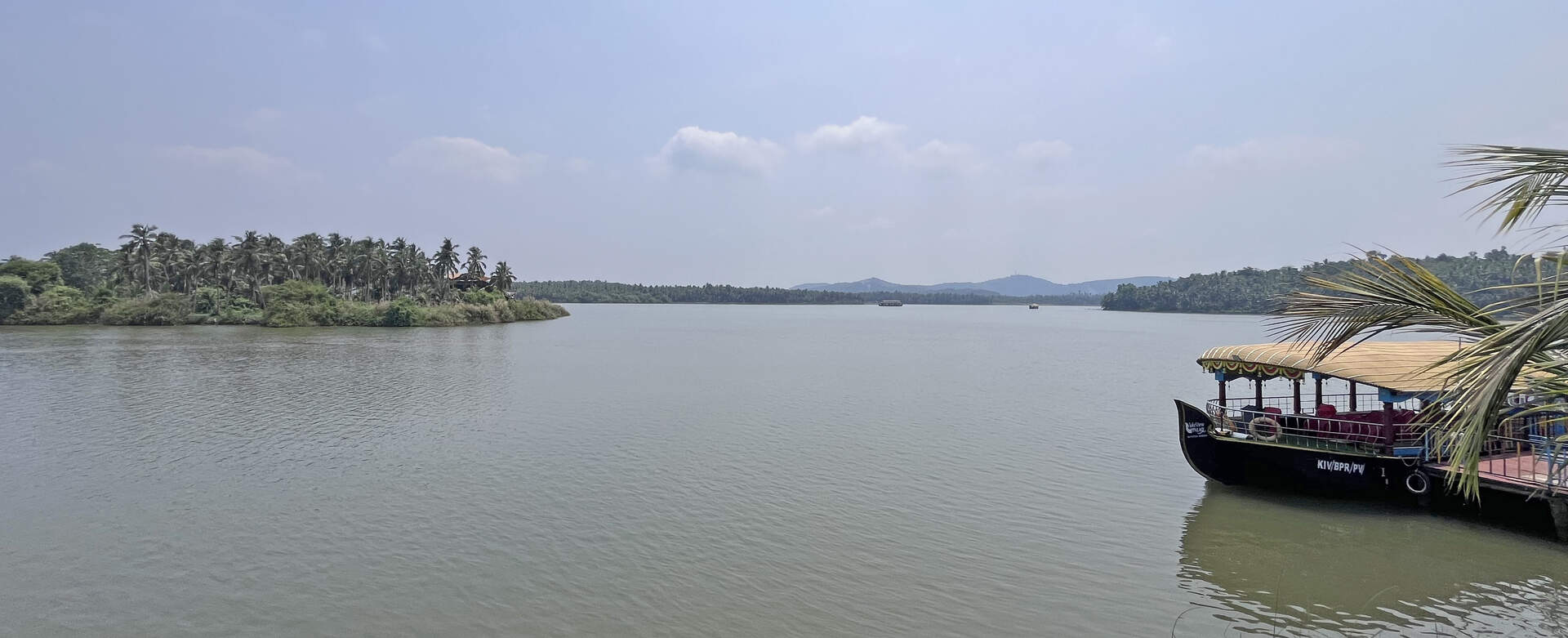 Boat ride with island view in Akalappuzha backwaters