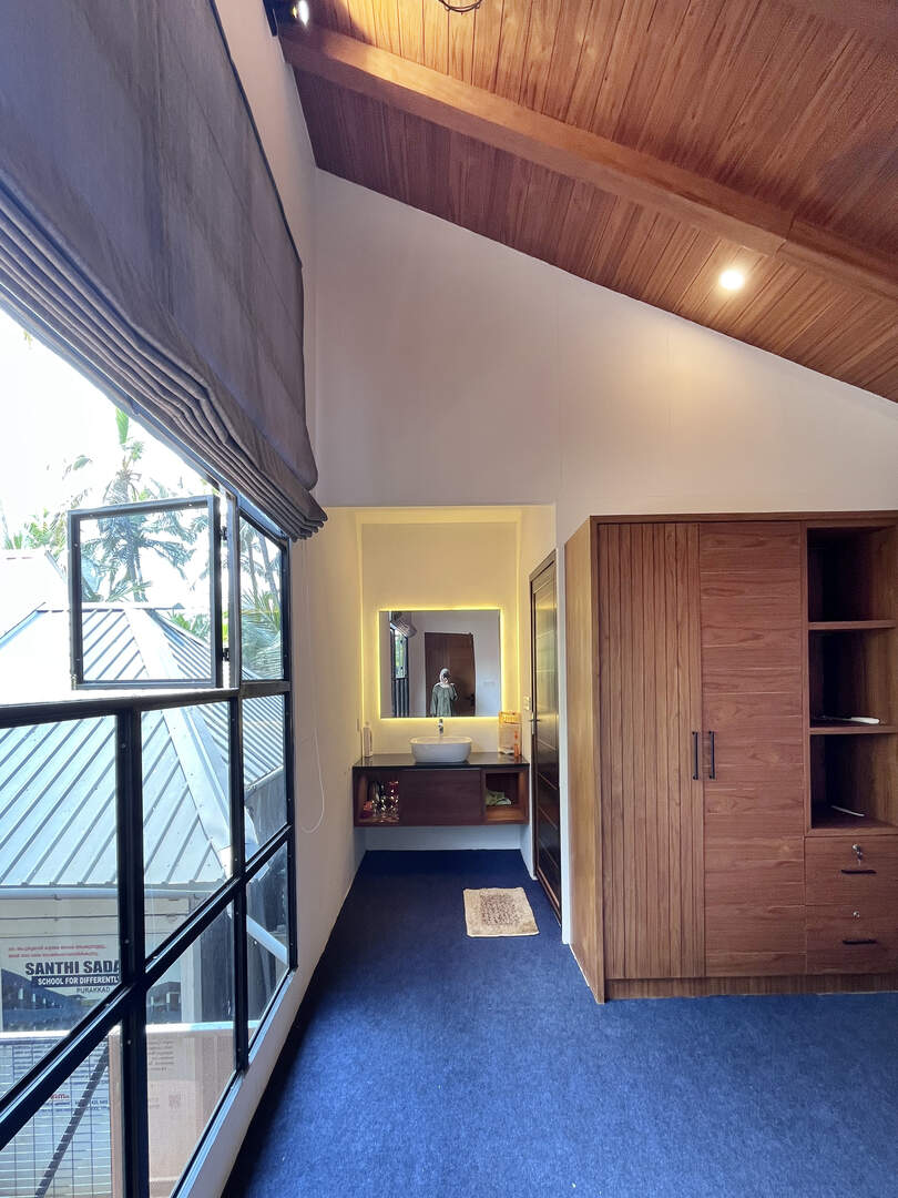 Side view of homestay bedroom with decor